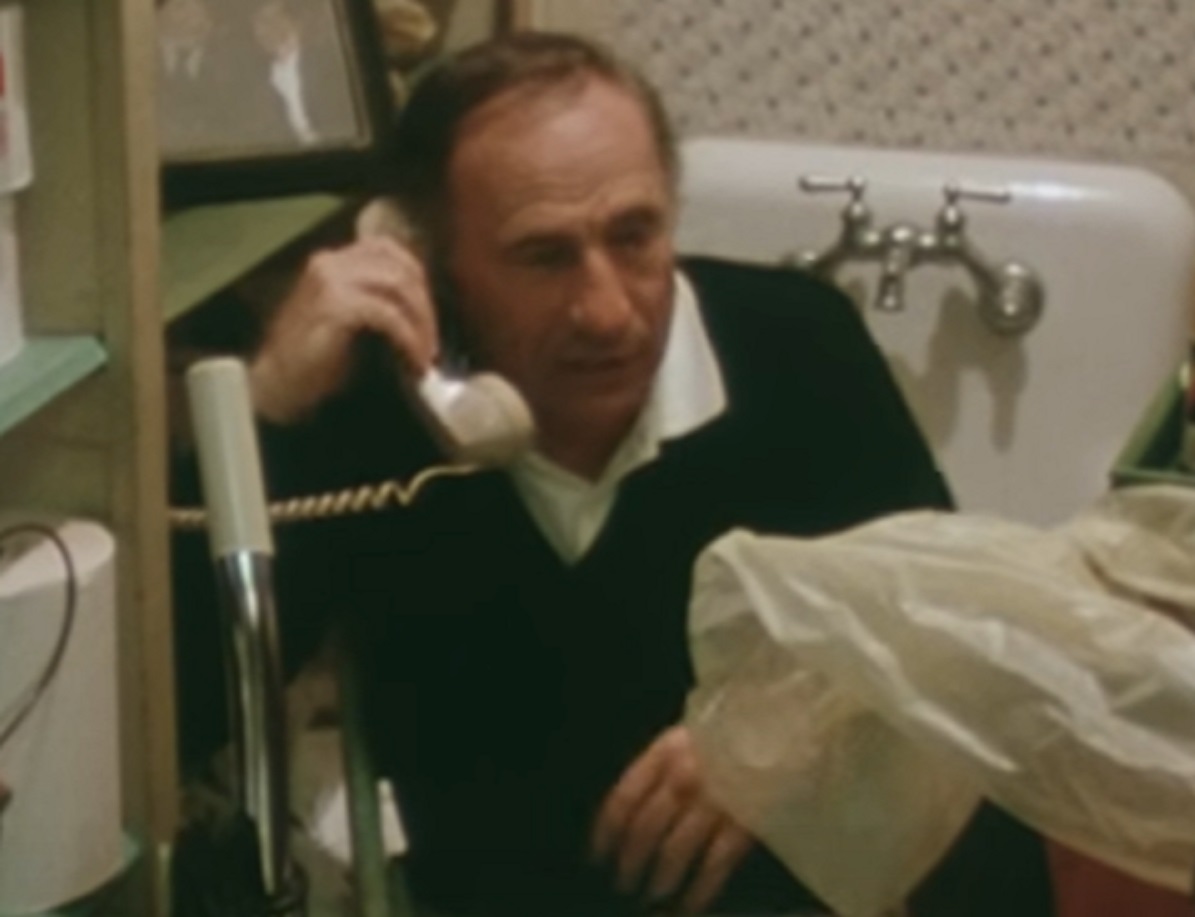 Screenshot: Mel Brooks is talking on the phone and looking at side - from Mel Brooks-Unwrapped (2018)