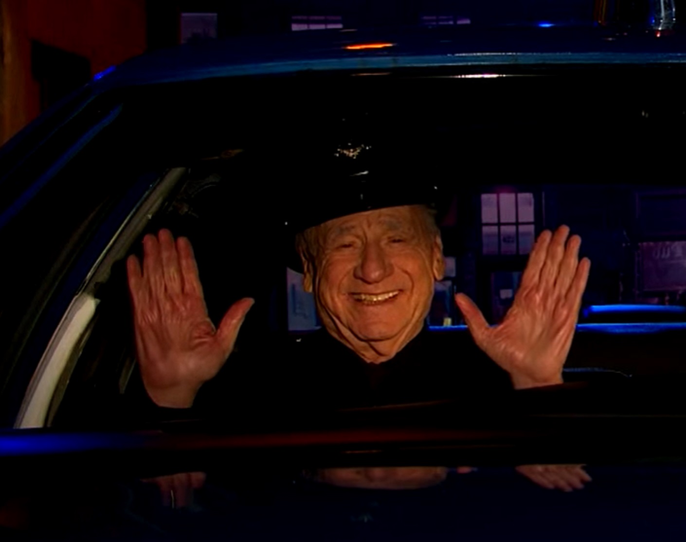 Mel Brooks wearing police uniform is seating in the car - from The Late Late Show With James Corden (2015-2023)