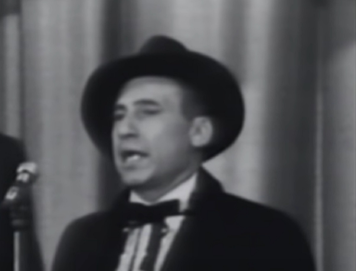 Screenshot: Mel Brooks is singing in the stage - from The Steve Allen Show (1952)