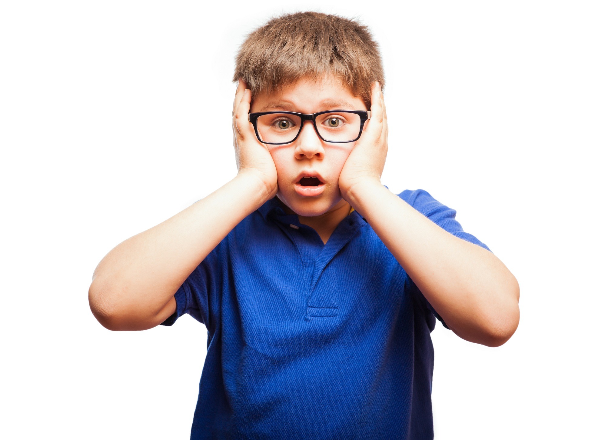 Small kid is holding his head with shocked face.