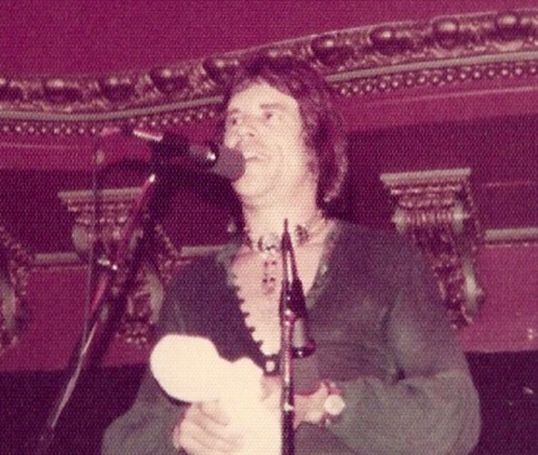 John Guerin is performing on the stage - 1976