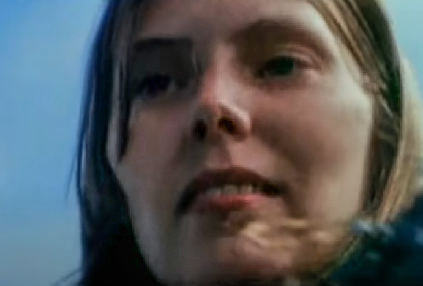 Screenshot: Joni Mitchell looking at side - from Joni Mitchell: A Woman of Heart and Mind (2003)