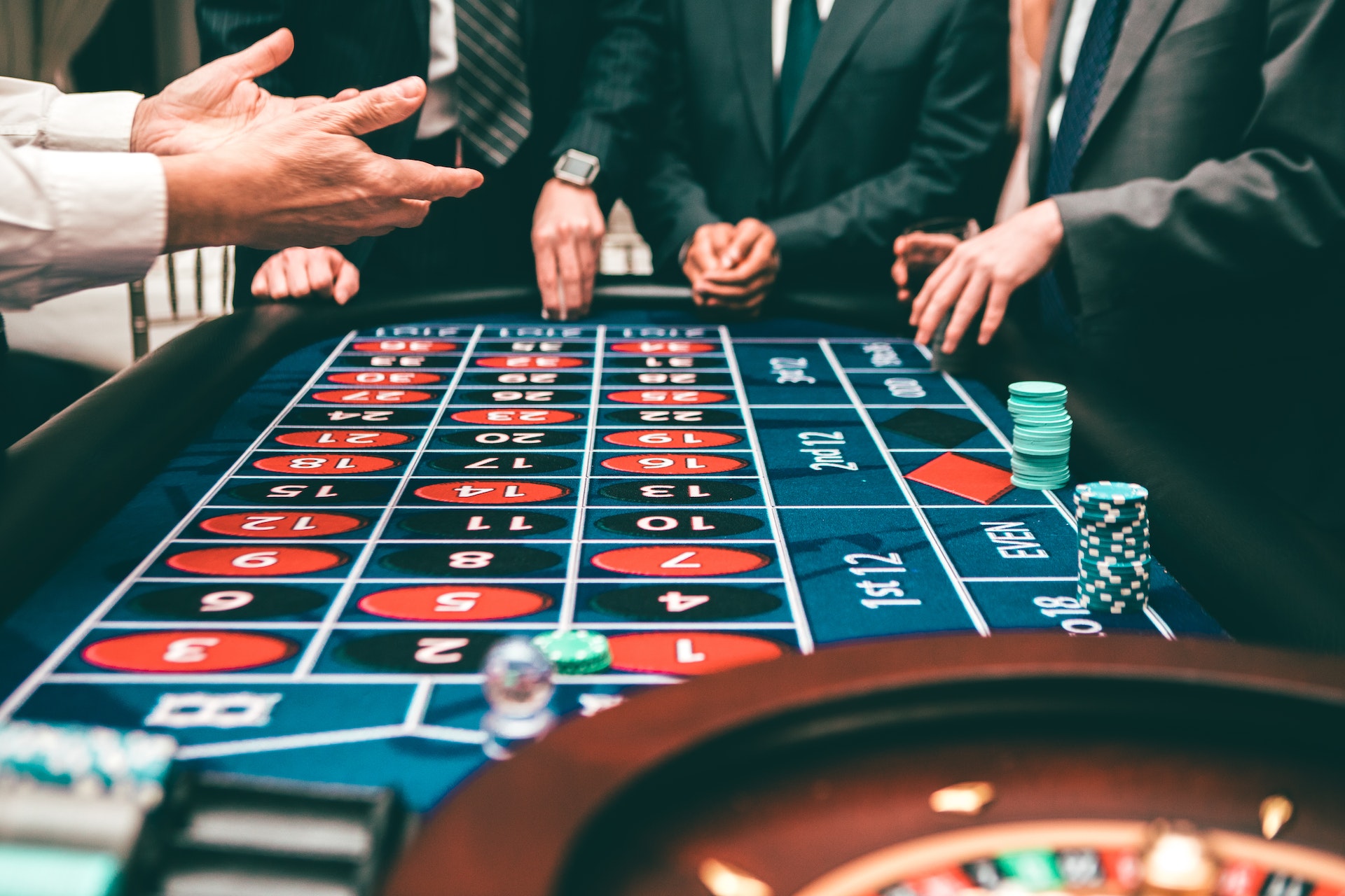 Men in suits at a casino