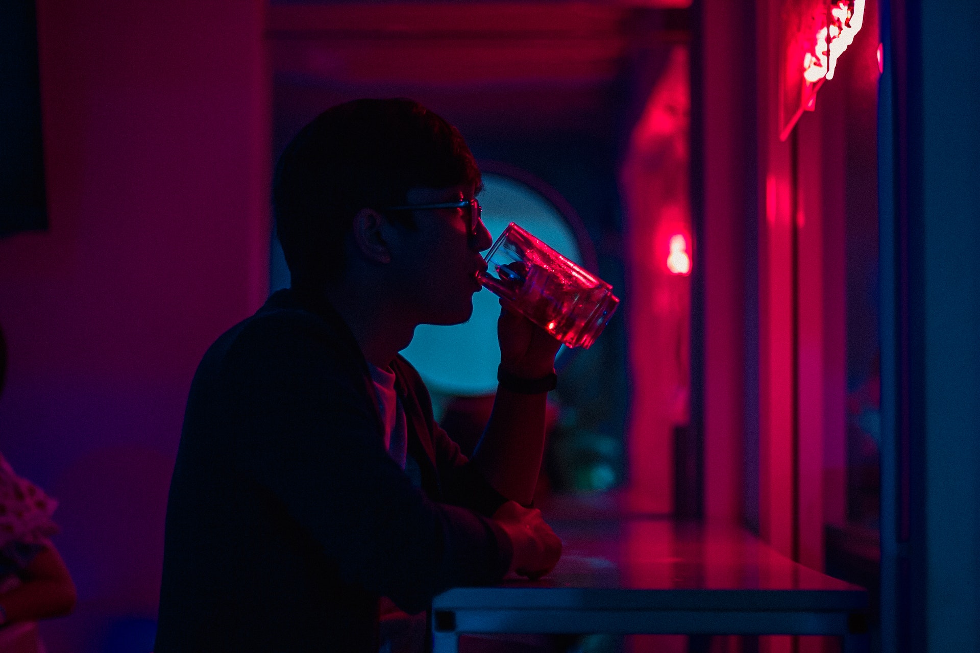 Man drinking at a bar