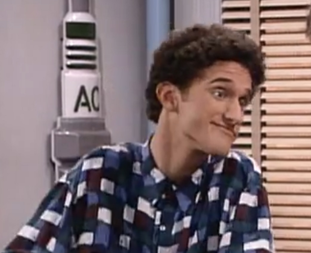 Screenshot: Dustin Diamond is looking funny at side - from Saved by the Bell: The College Years (1993-1994)