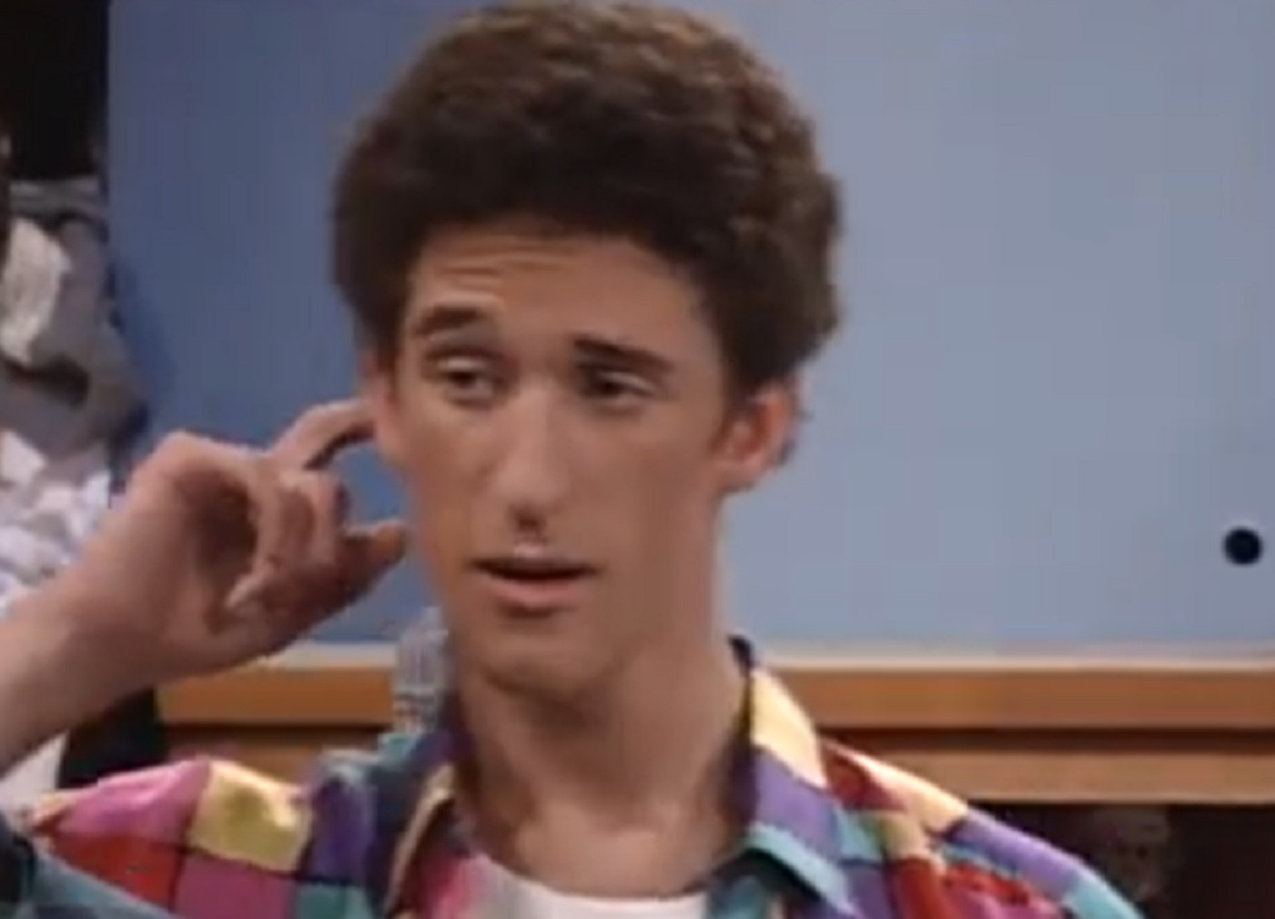 Screenshot: Dustin Diamond  looking at side and scratching his head - from The College Years (1993-1994)