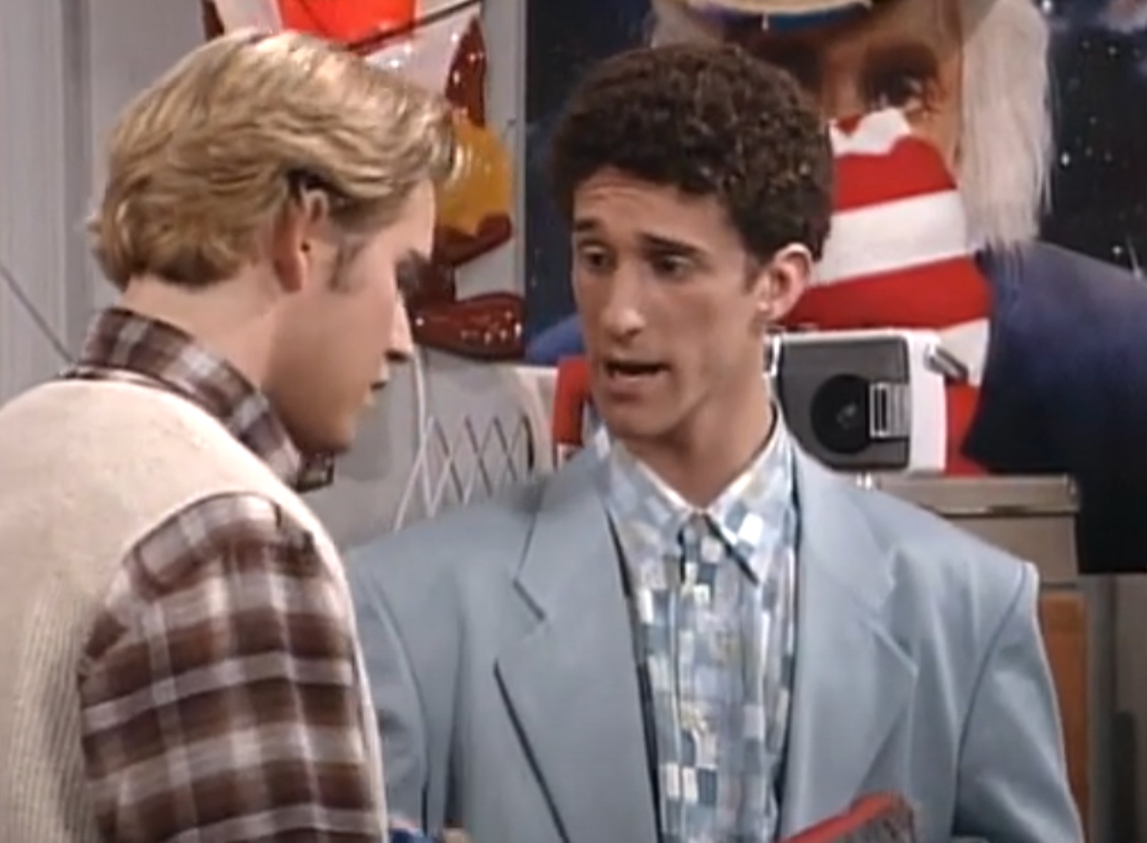 Screenshot: Dustin Diamond is talking with other male  - from Saved by the Bell: The College Years (1993-1994)