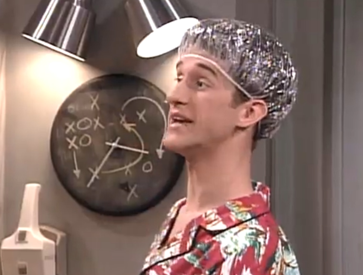 Screenshot: Dustin Diamond wearing nylon head cap is talking and looking at side - from The College Years (1993-1994)