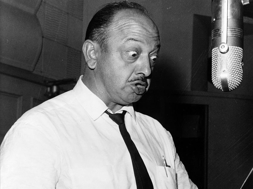 Radio and cartoon voice actor Mel Blanc in the recording studio poses for a Warner Bros publicity still circa 1960 in Los Angeles, California