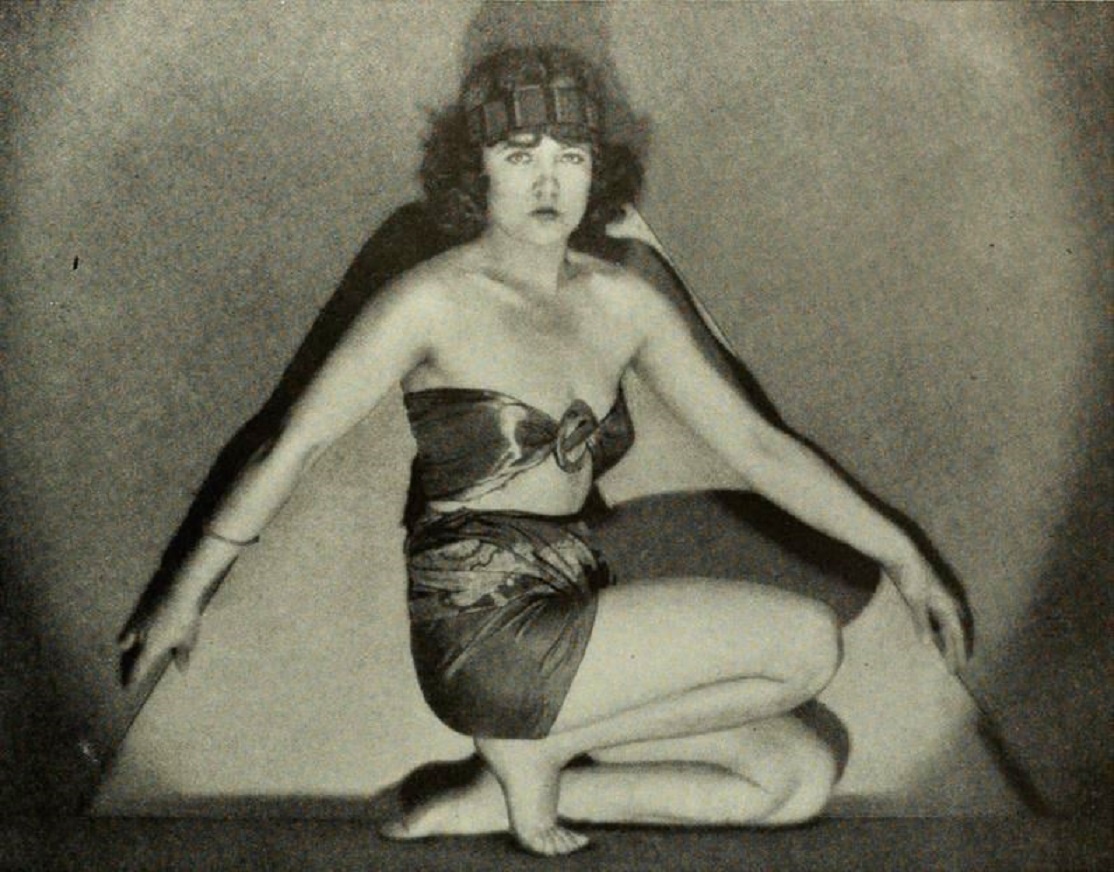 Marie Prevost wearing dress and hat is looking at camera - 1922