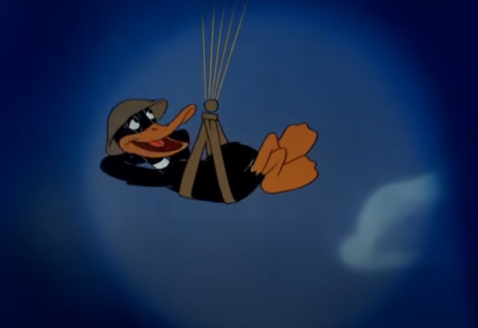 Daffy flying a parachute