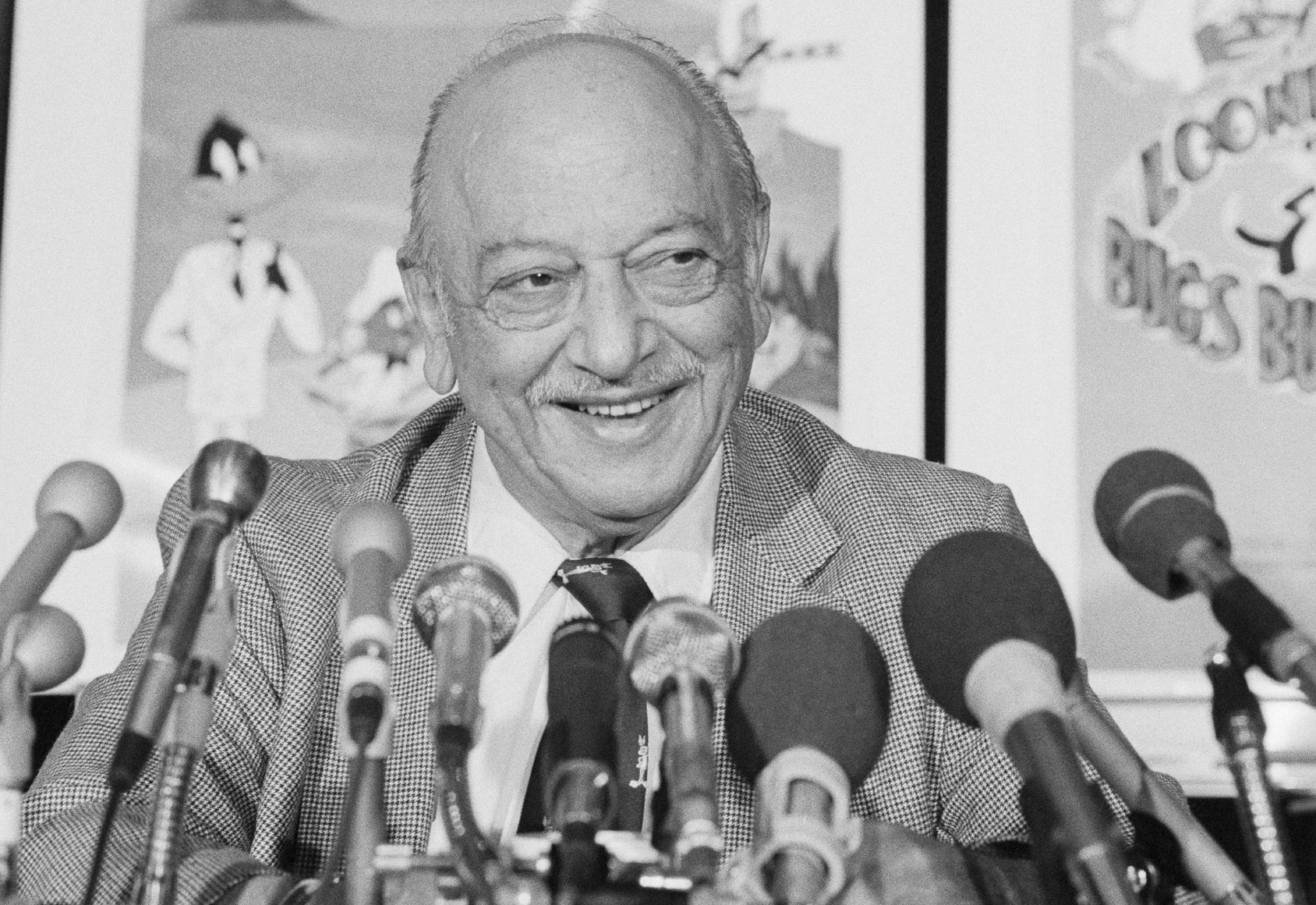 Mel Blanc, the voice of Bugs Bunny, Porky Pig, and other cartoon characters, holds a press conference