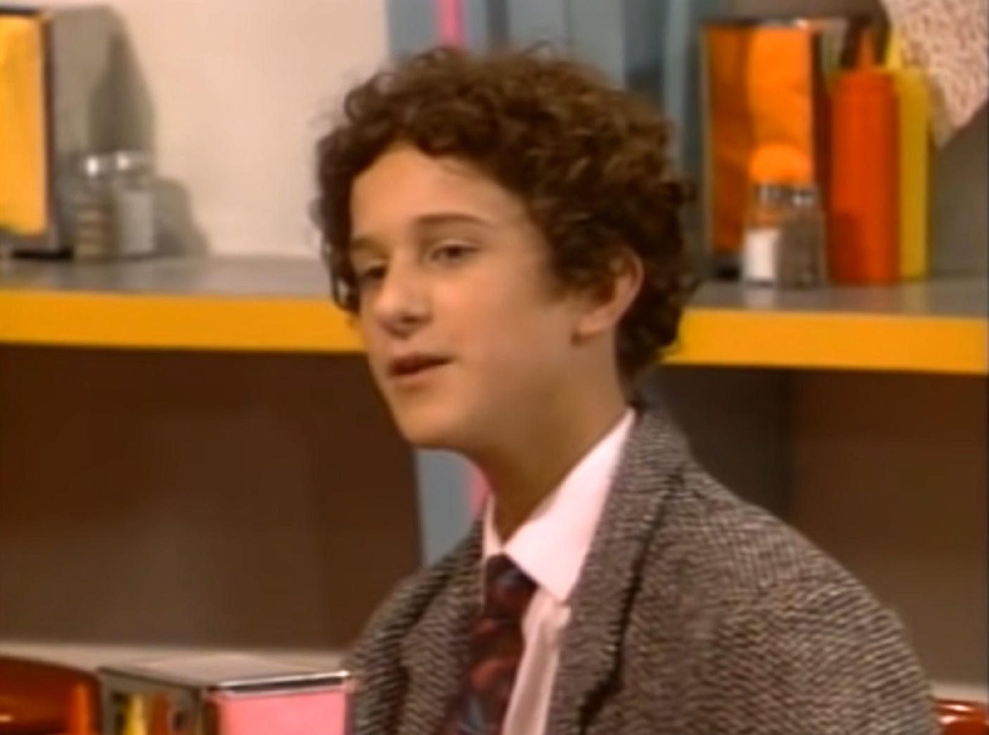 Screenshot: Dustin Diamond looking at side - from Saved by the Bell (1989-93)