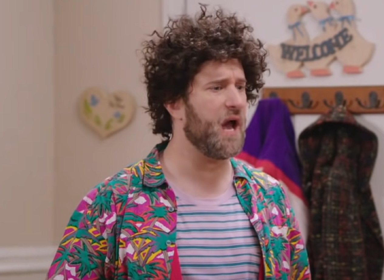Screenshot: Dustin Diamond with messy hair is yelling and looking at side - from Your Pretty Face Is Going to Hell (2013-2019)