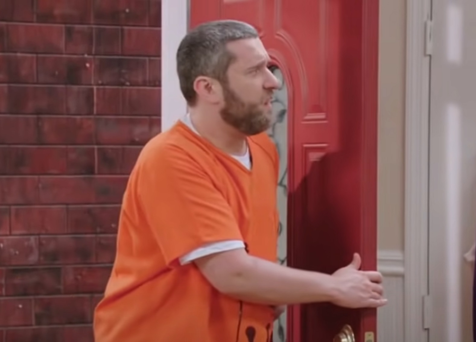 Screenshot: Dustin Diamond wearing orange jail clothes , coming home - from Your Pretty Face Is Going to Hell (2013-2019)