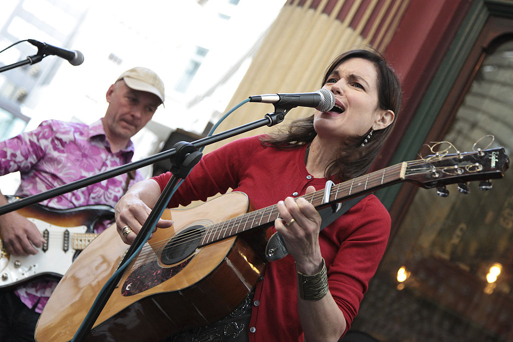 Actress Elizabeth McGovern performs with her band Sadie And The Hotheads in red top