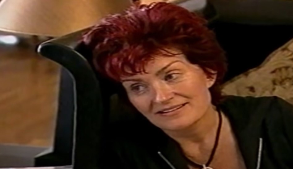 Sharon Osbourne in black top at home 