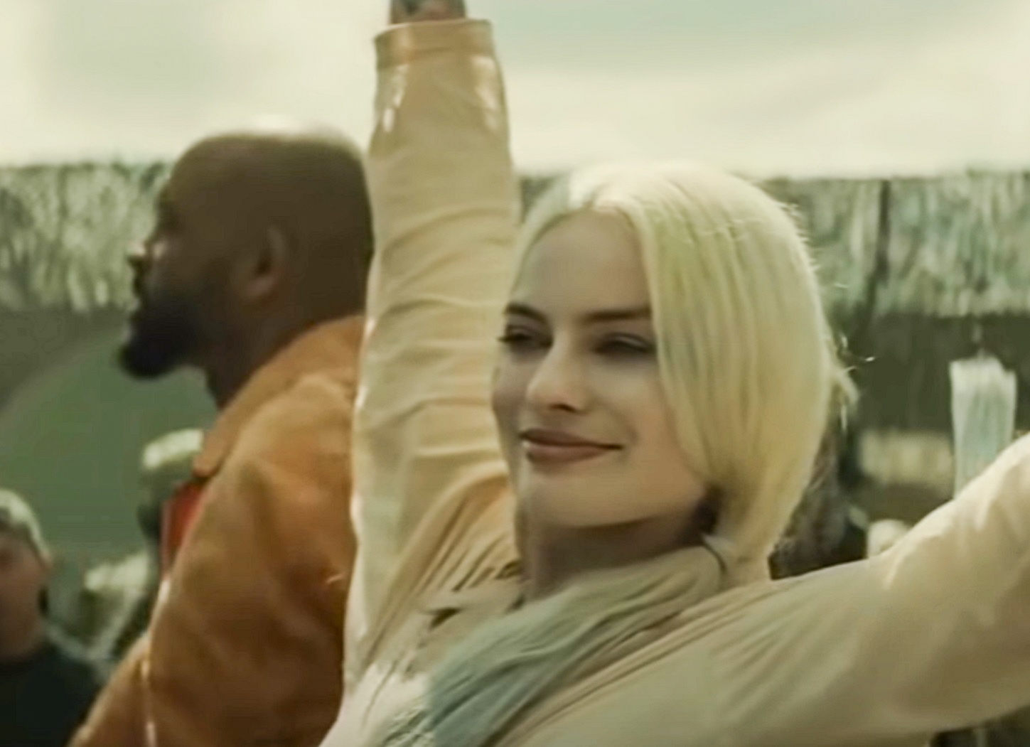 Screenshot: Harley Quinn (Margot Robbie) is smiling - from Suicide Squad (2016)