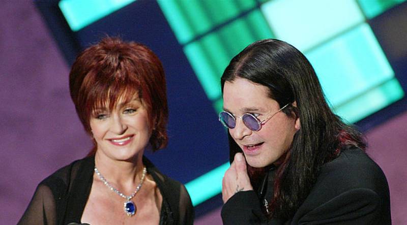 Sharon and Ozzy Osbourne at the 30th Annual AMAs speaking on stage
