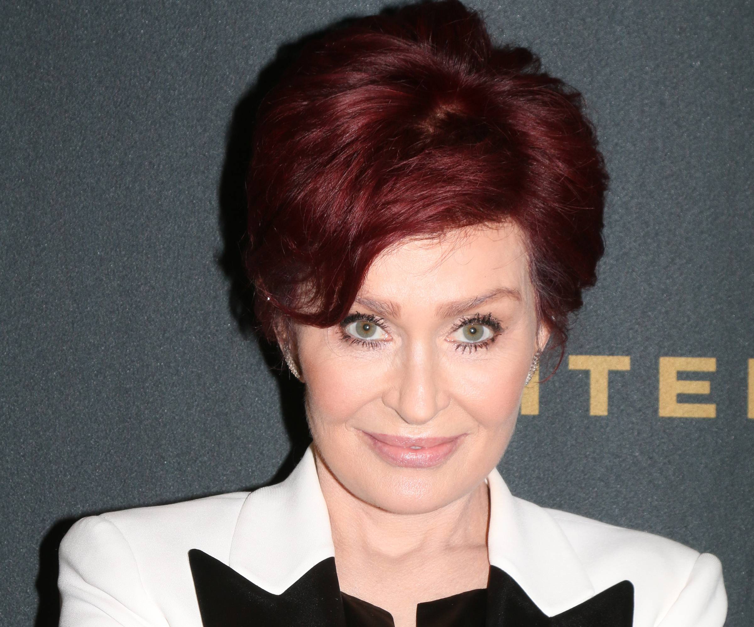 Sharon Osbourne at the 43rd Daytime Emmy Awards at the Westin Bonaventure Hotel on May 1, 2016 in Los Angeles, CA in white and black suit