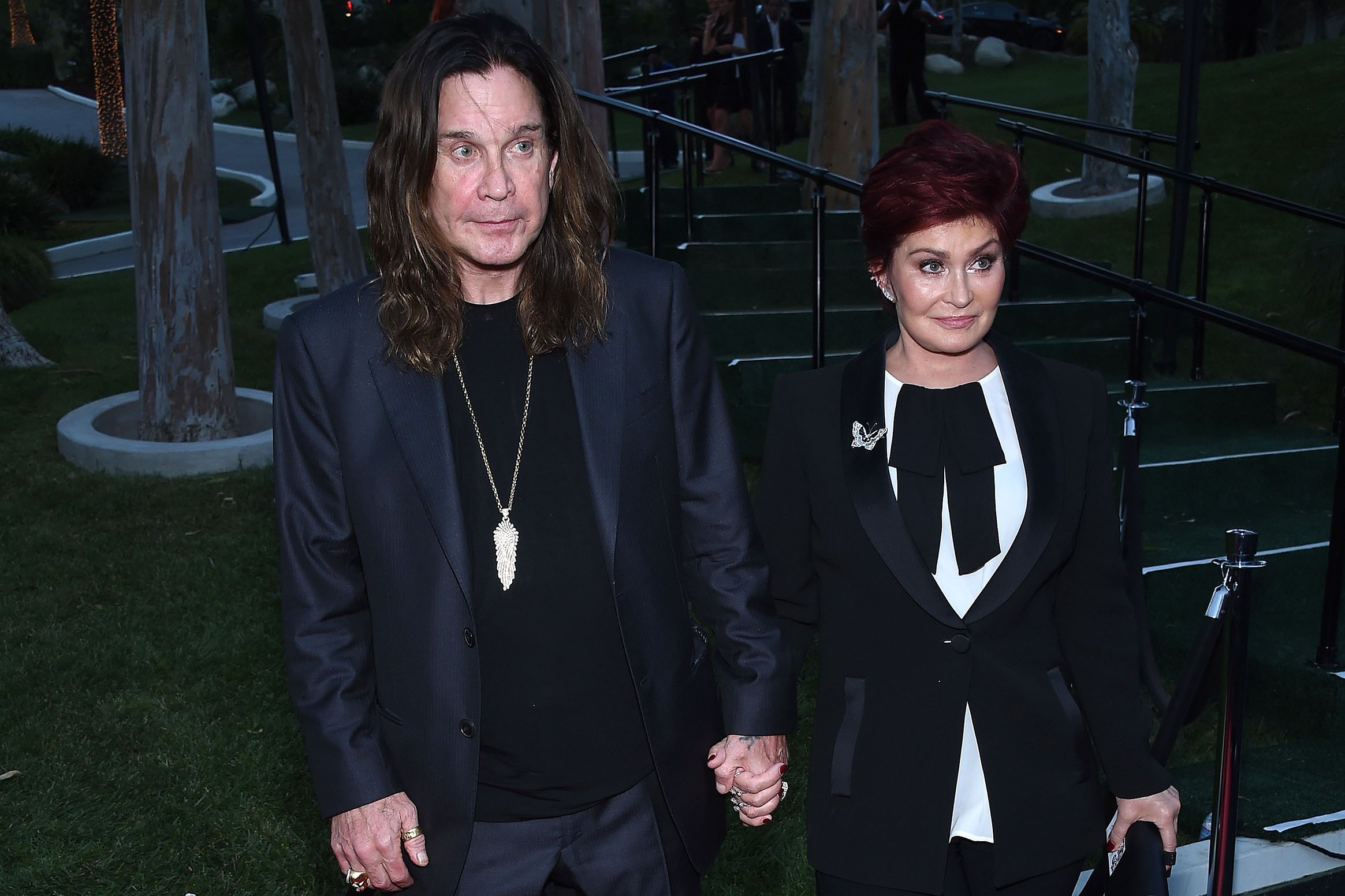 Ozzy Osbourne & Sharon Orbourne arrives to Brent Shapiro Foundation Summer Spectacular 2014 on September 13, 2014 in Los Angeles, CA in black