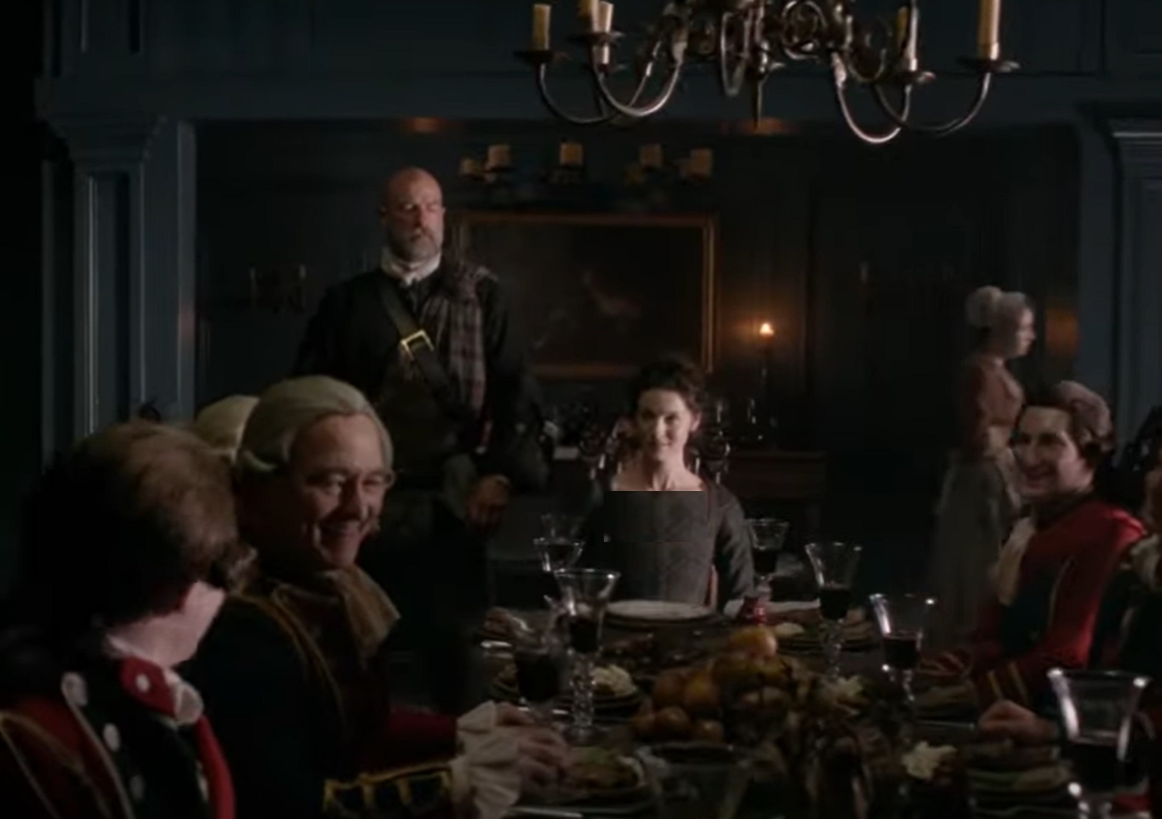 Claire Fraser (Caitríona Balfe) is having a lunch with other people - from Outlander (Tv Series)