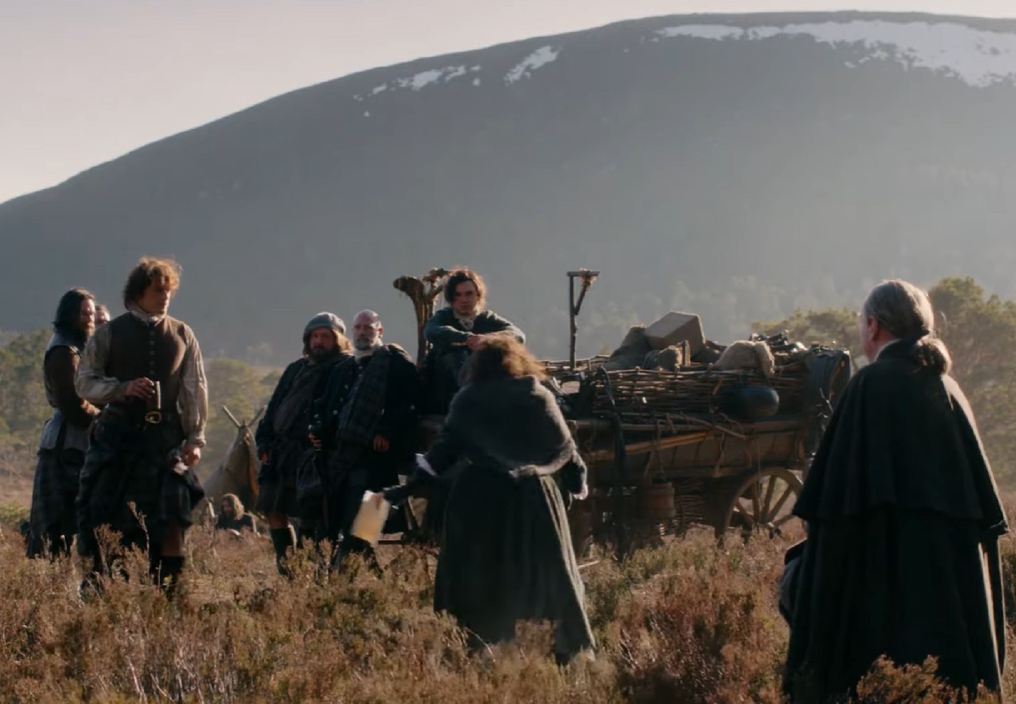Screenshot: Actors are walking outside in nature - from Outlander (TV series)