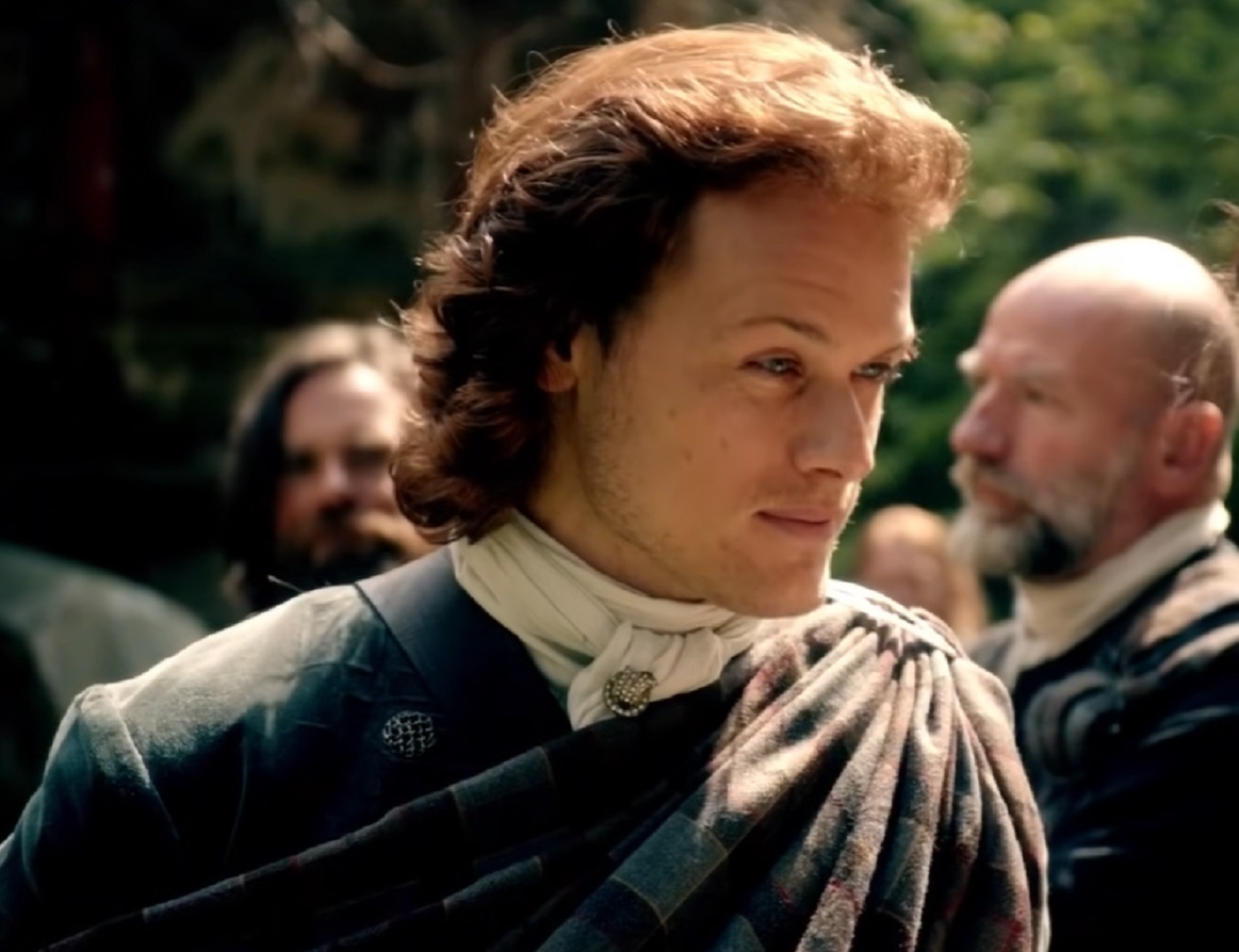 Jamie Fraser (Sam Heughan) looking at side - from Outlander (Tv Series)