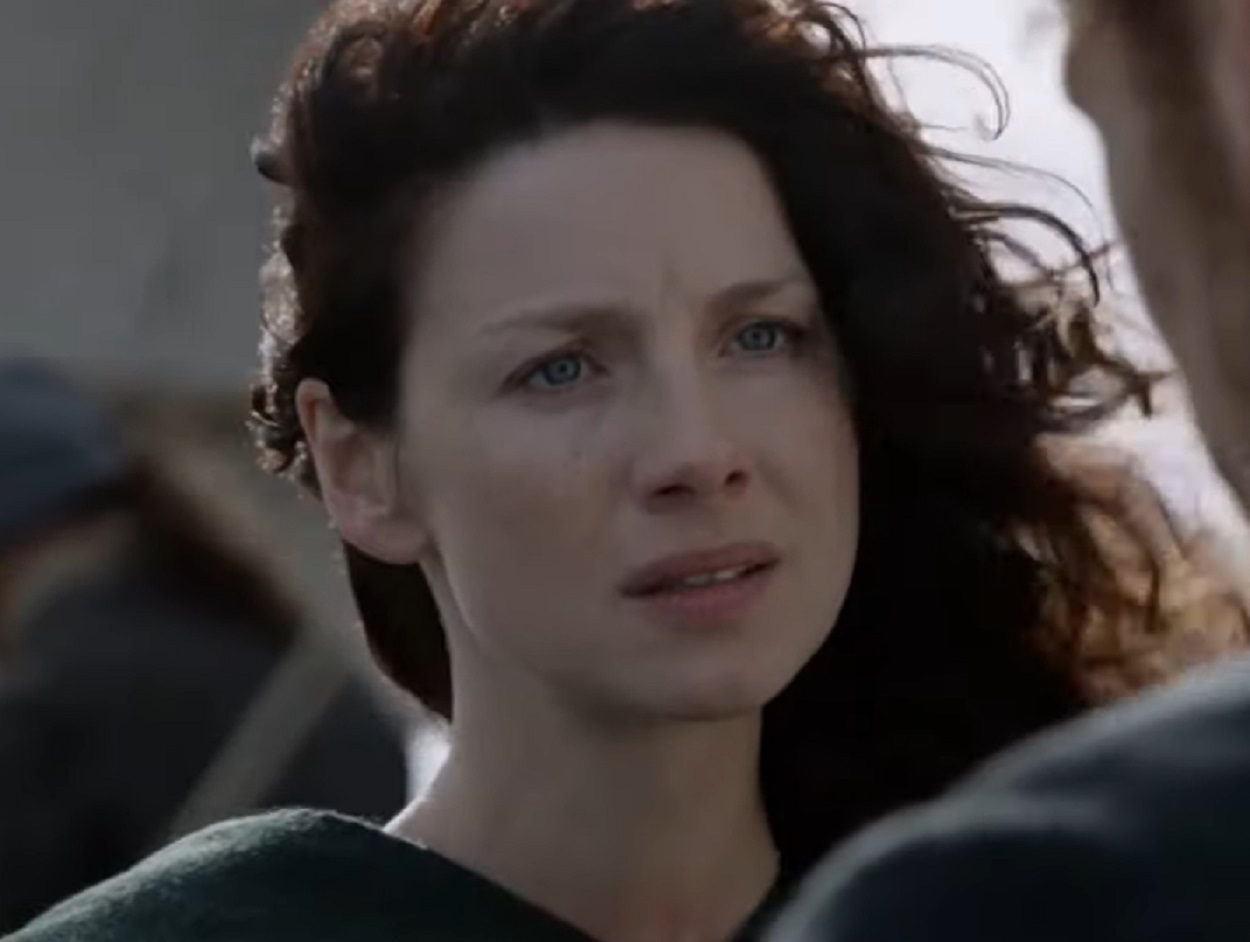 Screenshot: Claire Fraser (Caitríona Balfe) is talking with other person - from Outlander (Tv Series)