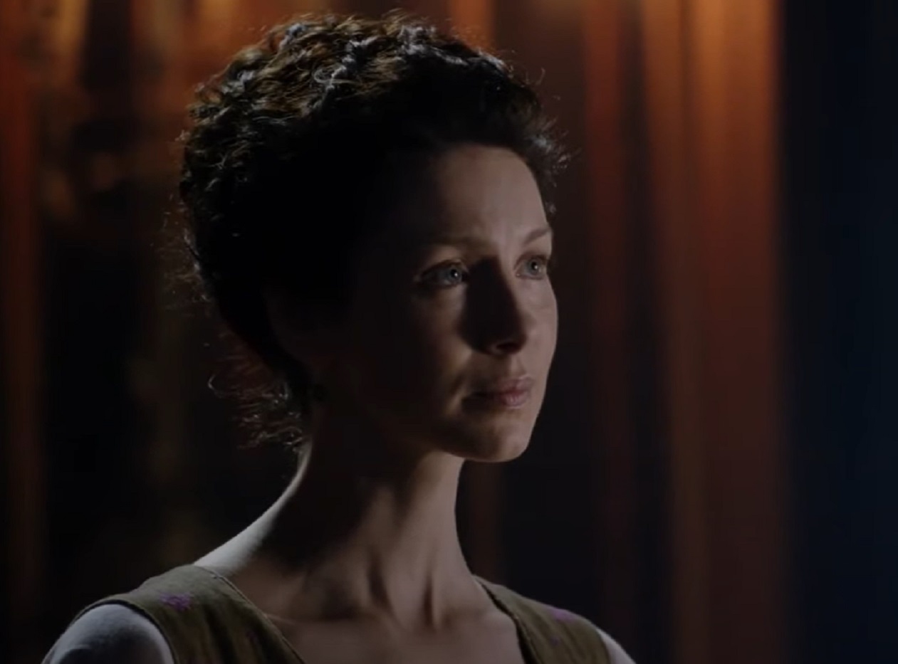 Screenshot: Claire Fraser (Caitríona Balfe) is looking at side - from Outlander (TV series)
