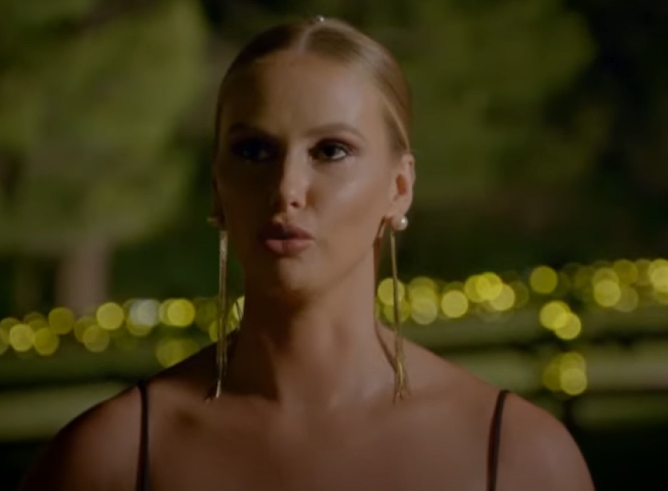 Screenshot: Rachael Arahill is talking and looking at side - from The Bachelorette (Australian TV series)