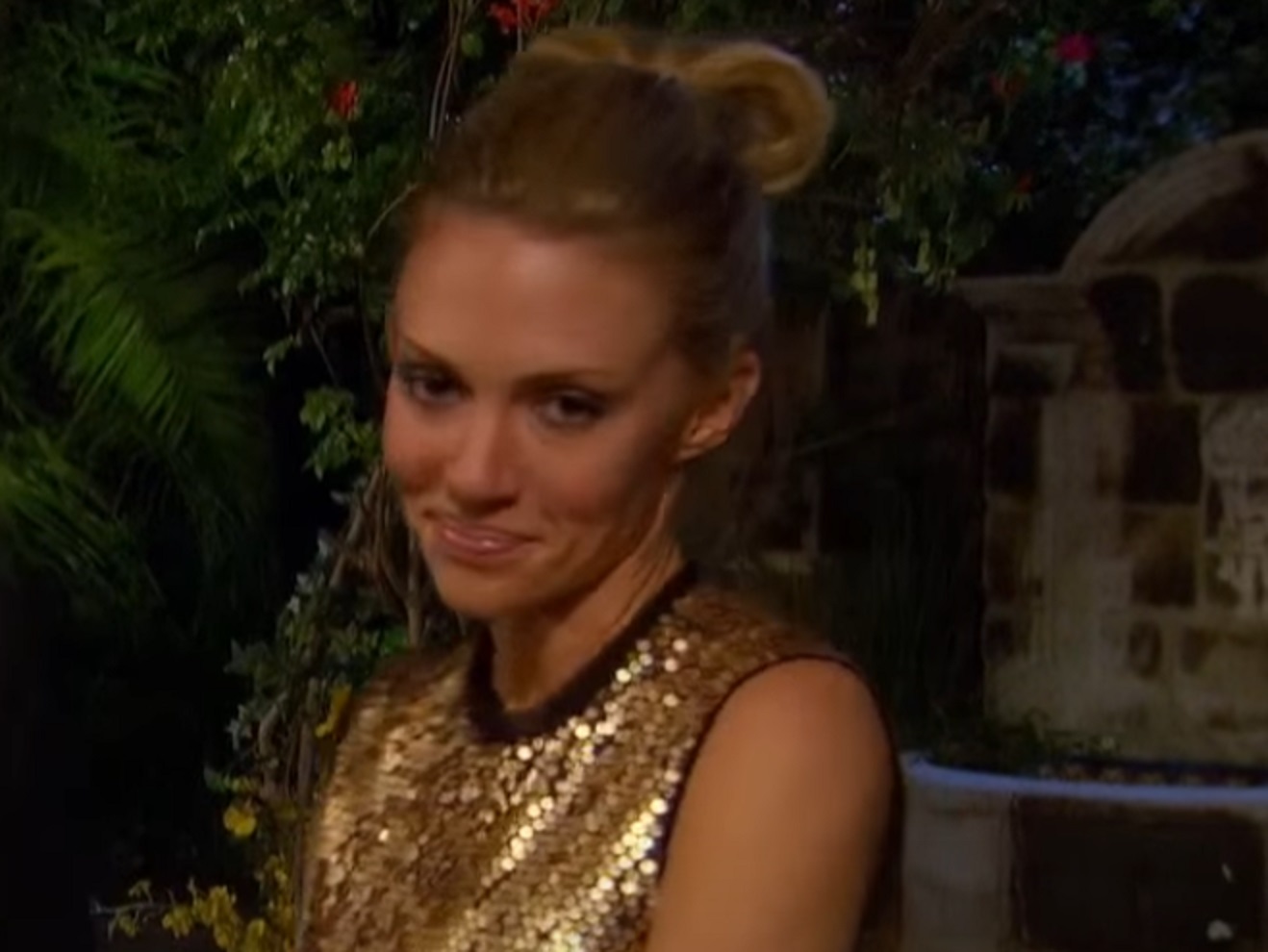 Screenshot: - Rozlyn Papa is looking down and smiling - from The Bachelor (American TV series)