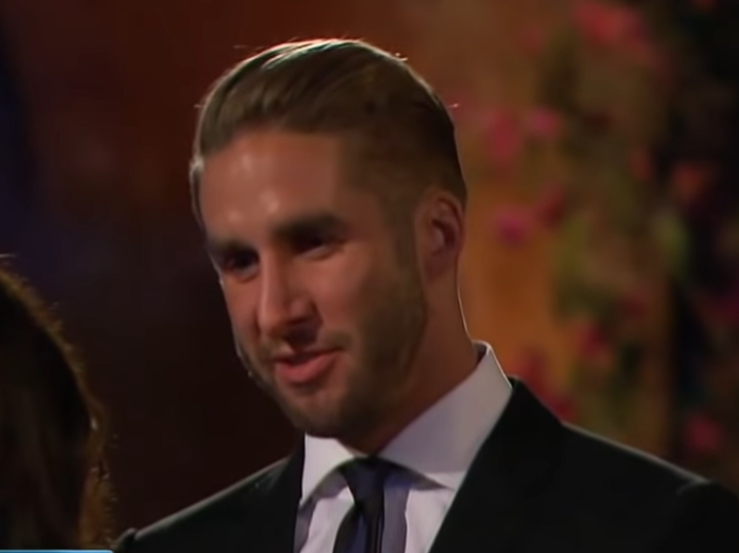 Screenshot: Shawn Booth is talking and looking at side - from The Bachelorette (American Tv Series)
