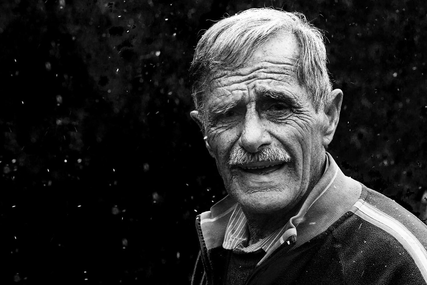 Black And White Photo Of An Old Man