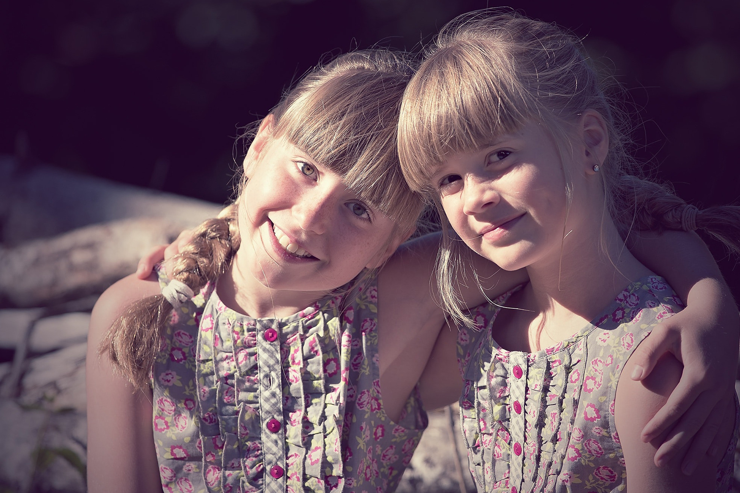 Twin Girls Embracing