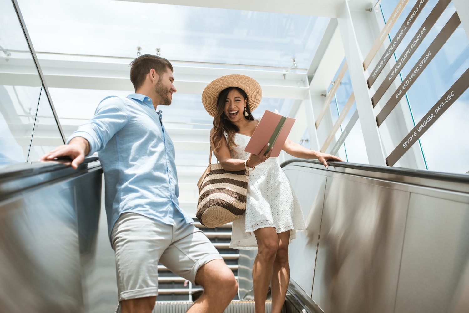 A Couple On An Escalator