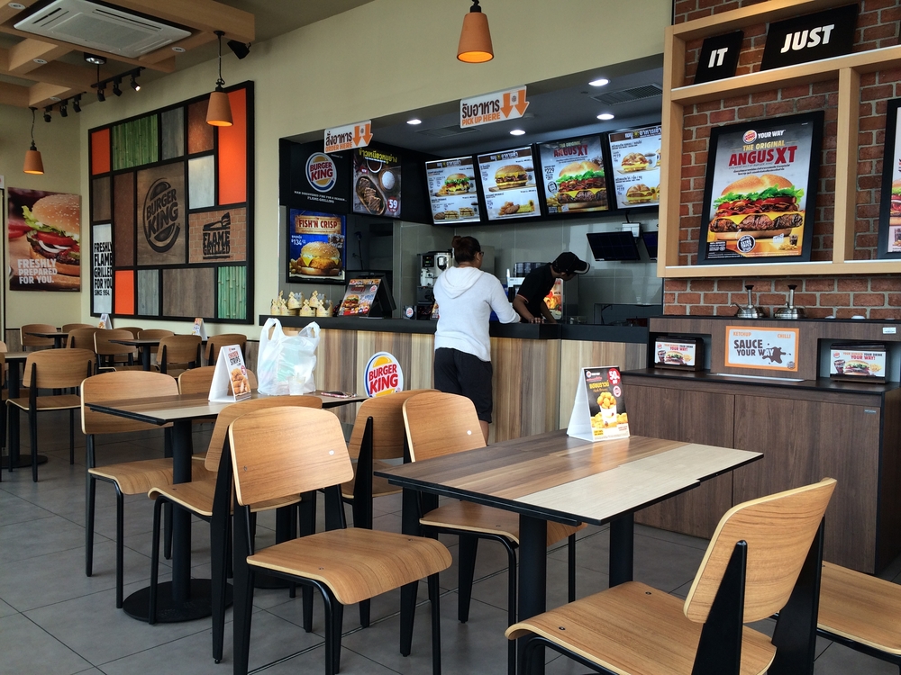 Burger King employee and customer at counter