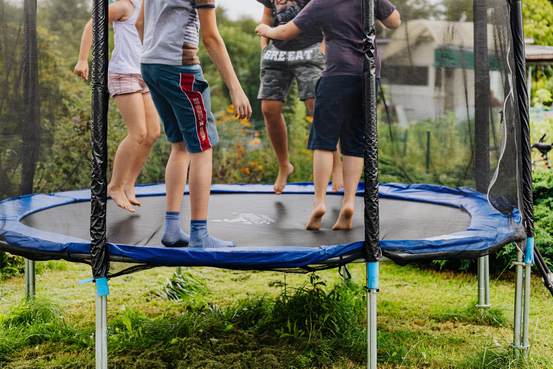 kids playing on a trampoline