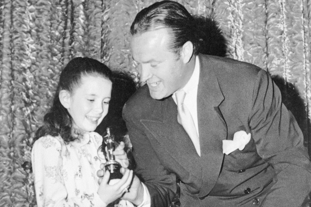 Bob Hope presents Margaret O'Brien with the Academy's first