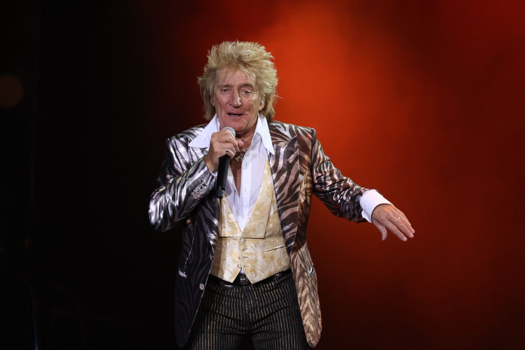Rod Stewart performs at Spark Arena on April 09, 2023 in Auckland, New Zealand in zebra print jacket