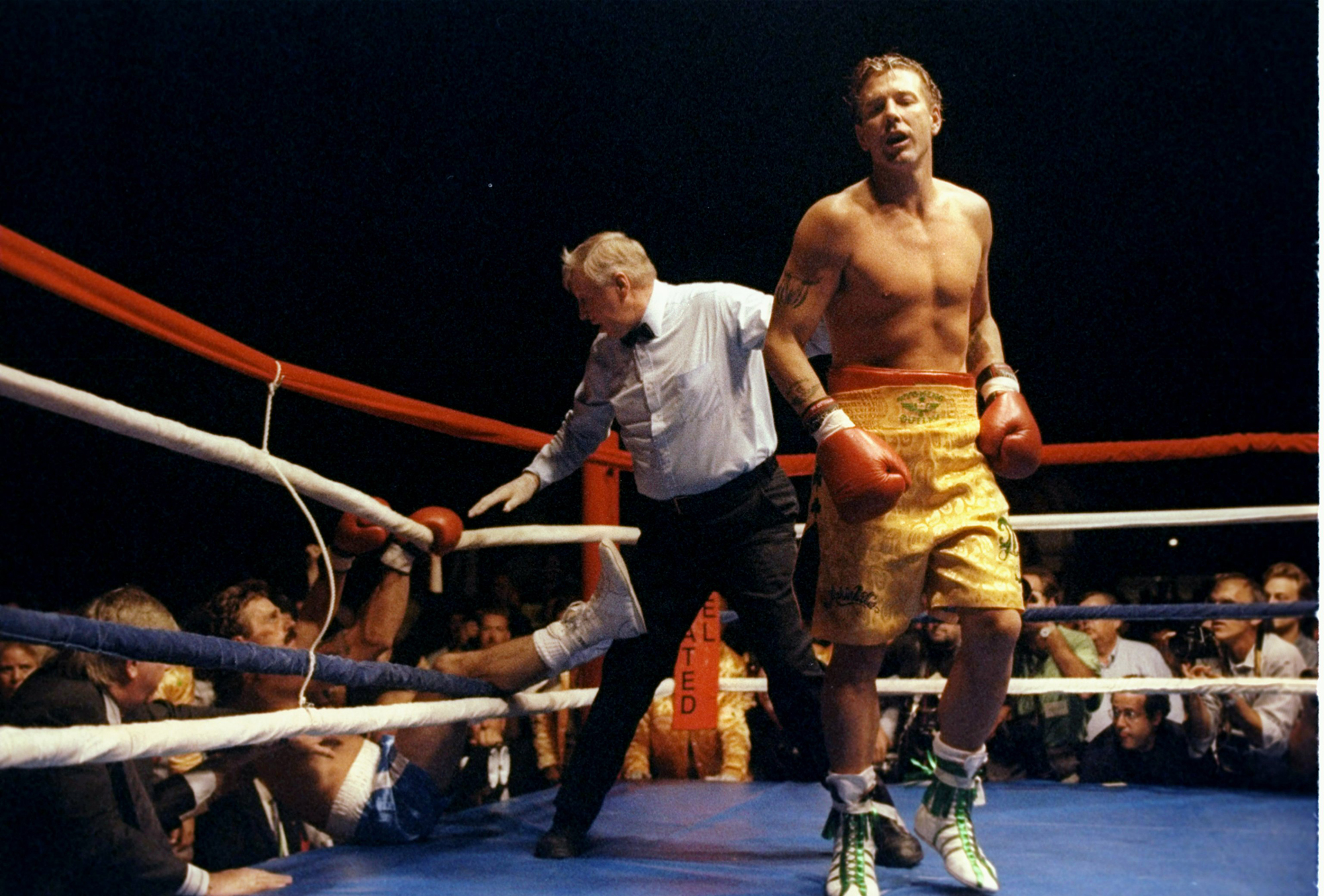 Undated: Mickey Rourke (right) walks away as the referee helps Rourke''s opponent Steve Powell out of the tangled ropes. Mandatory Credit: Mark Morrison /Allsport