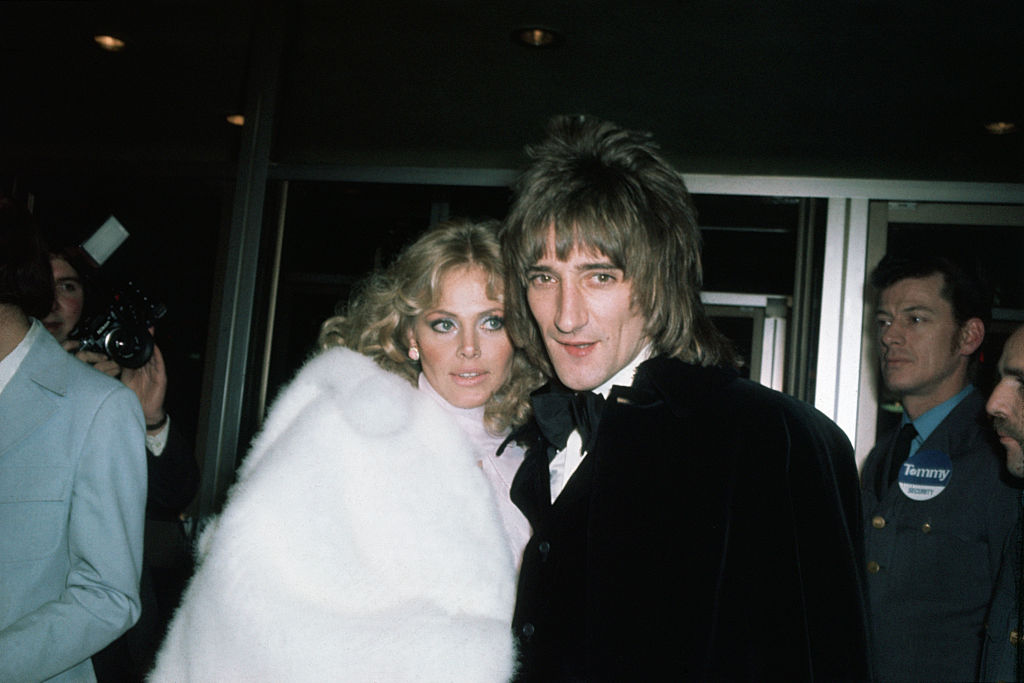 Rod Stewart, Scottish pop singer, with Britt Ekland, Swedish actress at an event in formal wear