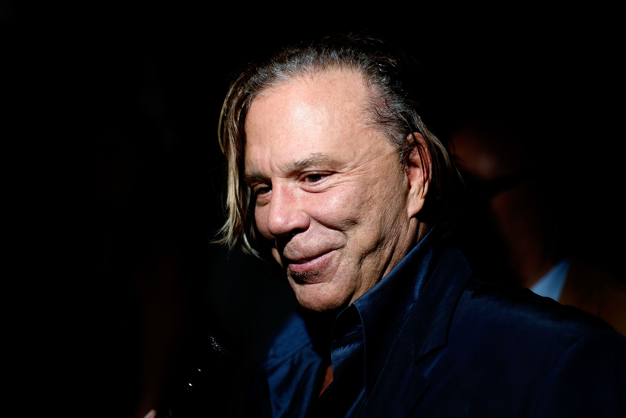 NEW YORK - SEPTEMBER 15: Actor Mickey Rourke attends Max Azria Spring 2010 during Mercedes-Benz Fashion Week at Bryant Park on September 15, 2009 in New York City. (Photo by Joe Kohen/WireImage)