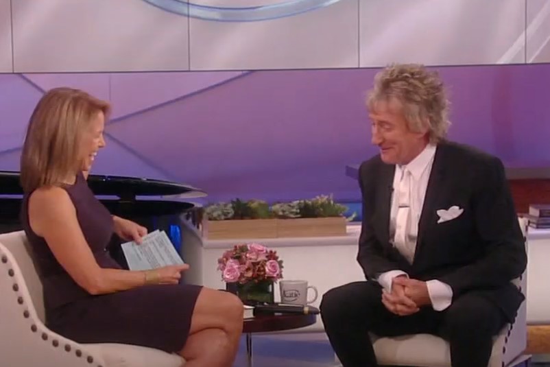 Rod Stewart and  Katie Couric on her show sitting on chairs