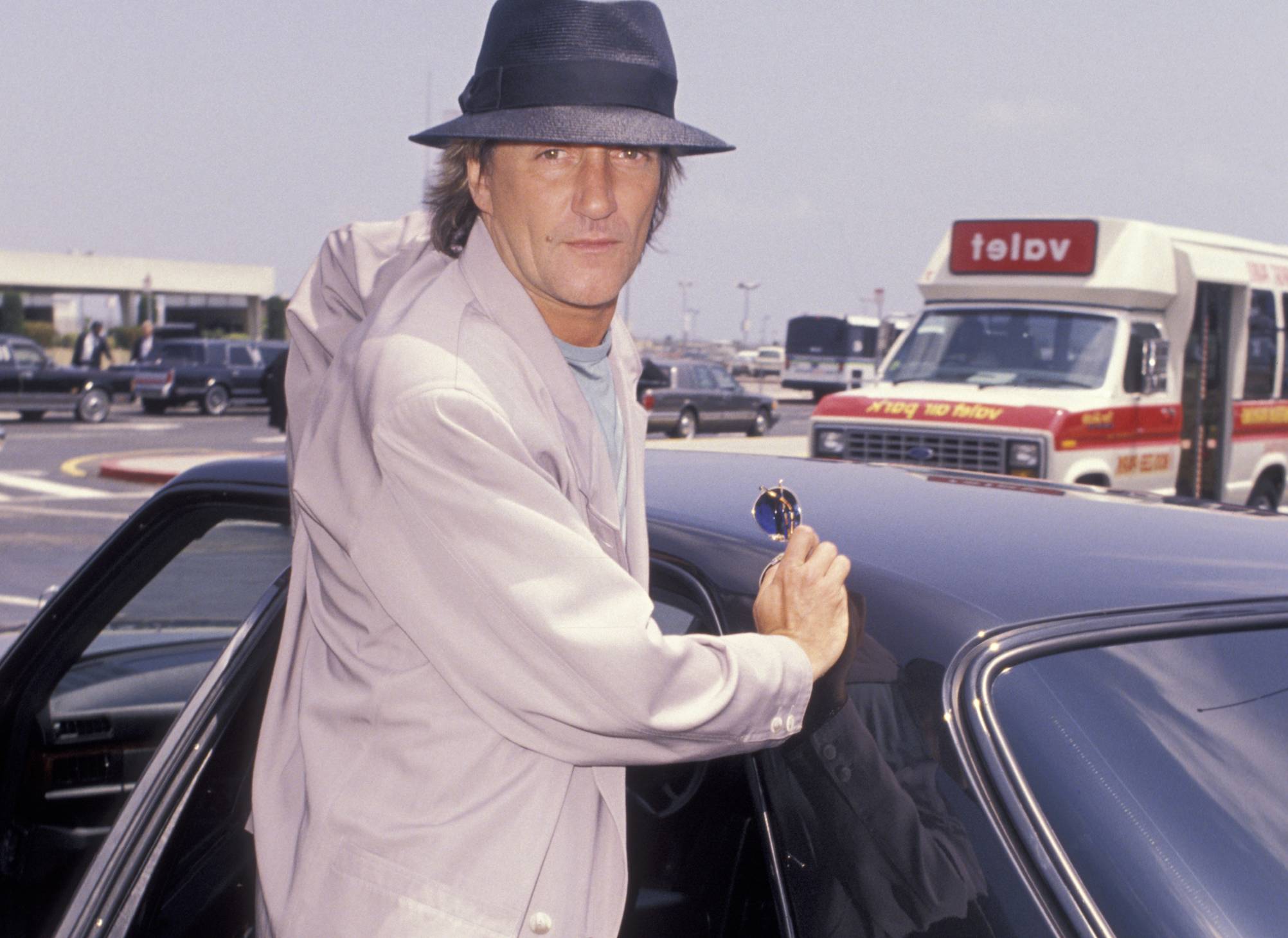 Rod Stewart during Rod Stewart and Kelly Emberg Sighting at Los Angeles International Airport in jacket and hat