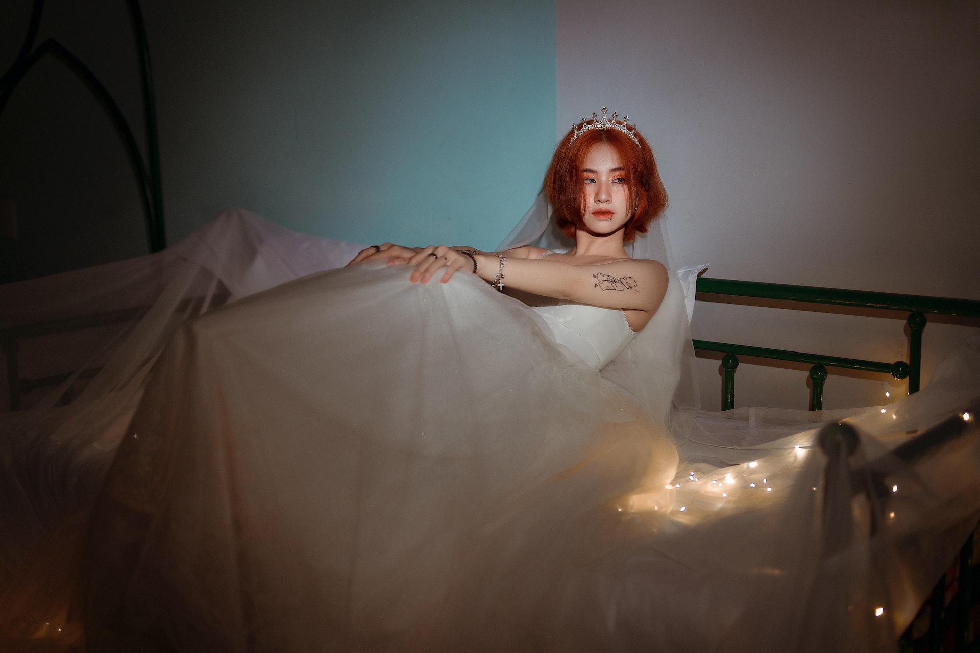 Asian bride with a tattoo on her arm