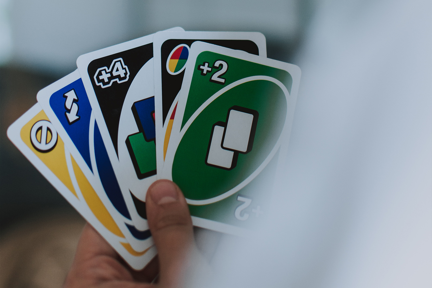 A Hand Of Uno Cards