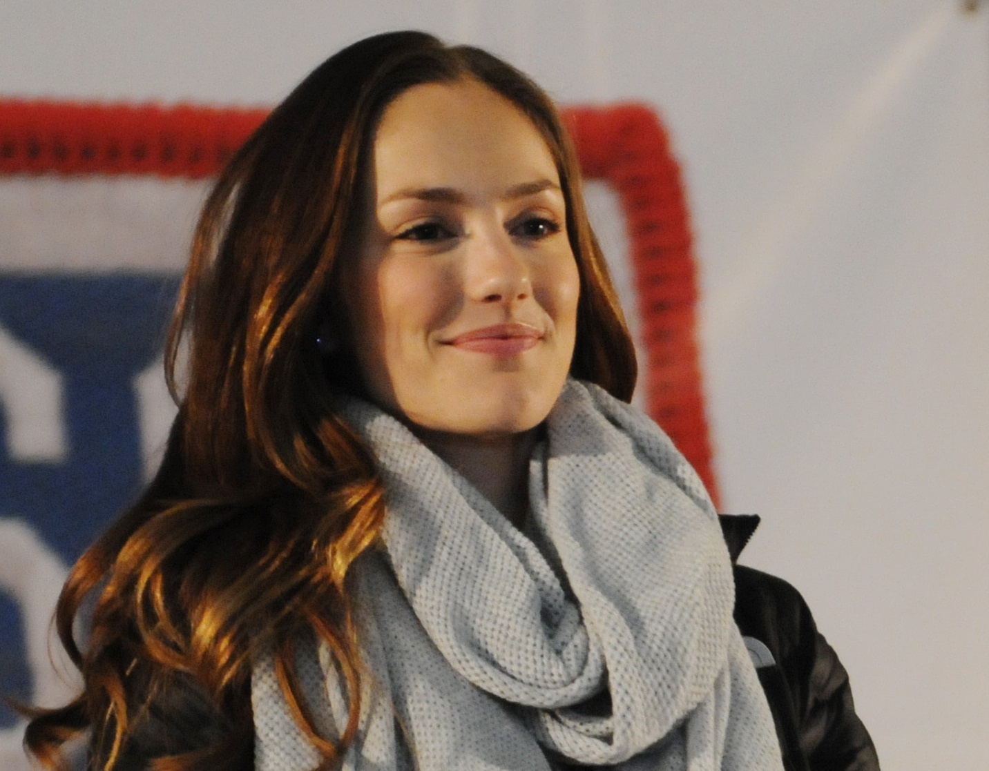 Minka Kelly is looking at side and smiling - 2011