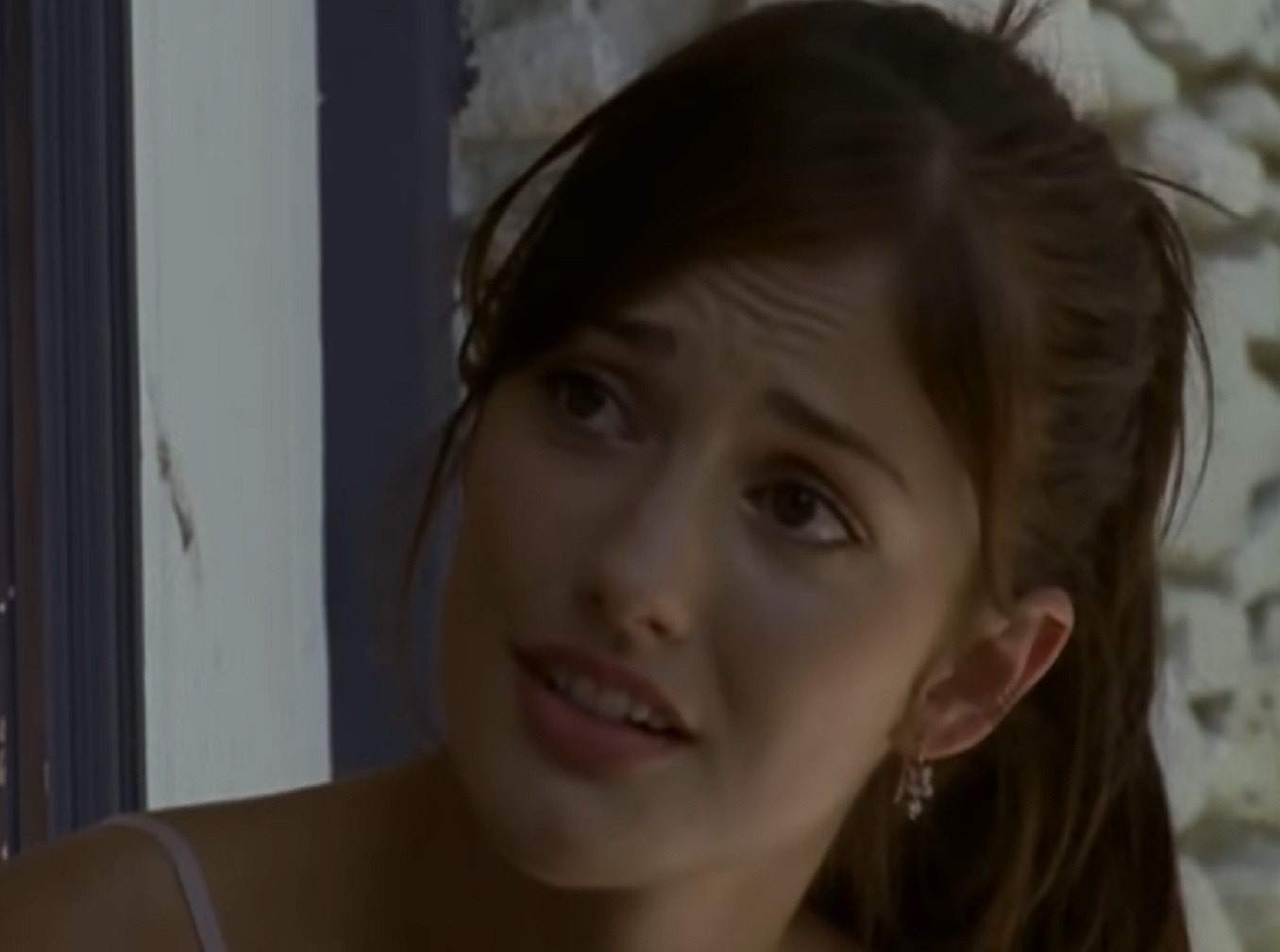 Screenshot: Minka Kelly is looking at side with surprised face - from Friday Night Lights (2006-11)