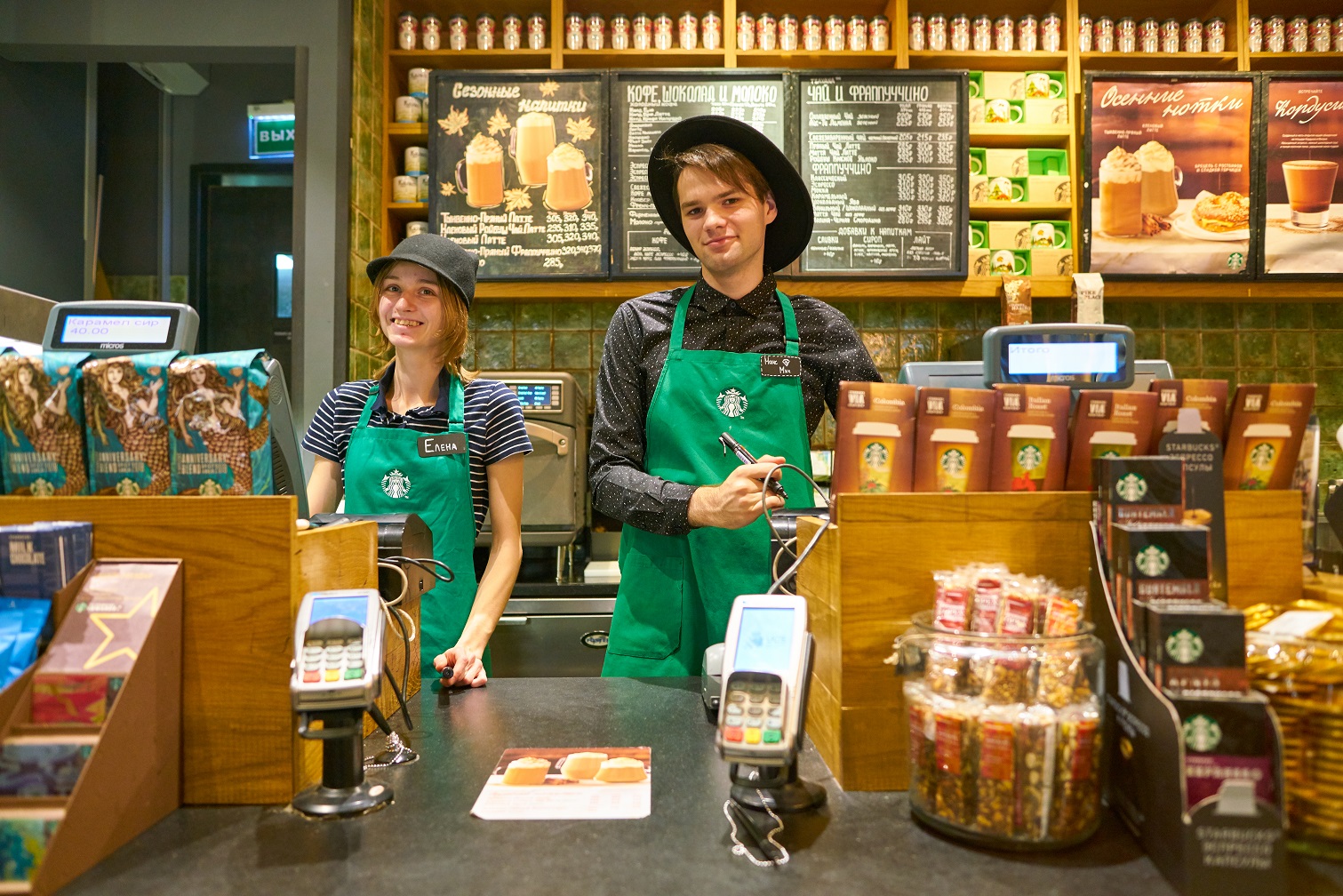 Staff wearing uniforms at Starbucks.